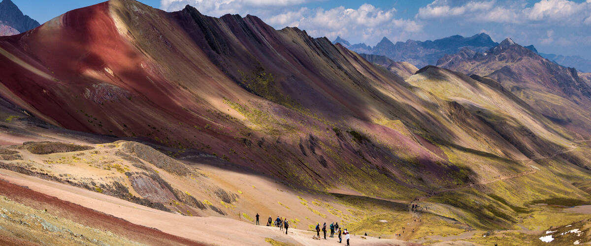 people-walking-along-rainbow-mountain